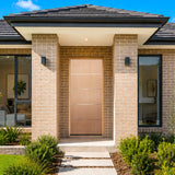 Four Seas OWT-AH entrance door installed in a home facade with metal inserts