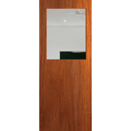 Wooden door with a glass panel on a green background. BFR14_Merbau_Clear.