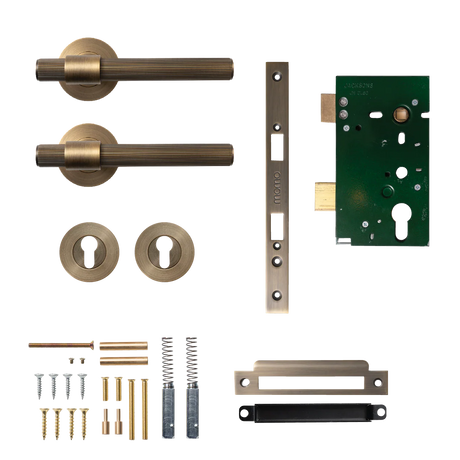 Collection of brass door handles and lock components on a white background. BelgraviaSolidBrassLinedLeverEntranceSetInDarkBrushedBrass