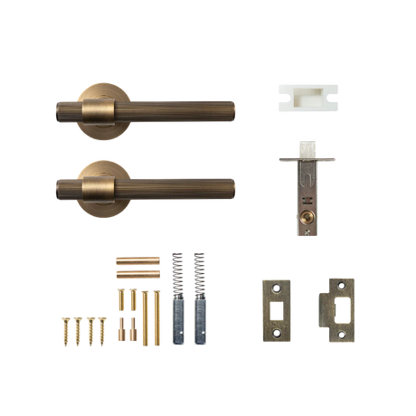 Bronze door handle set with components on a white background. BelgraviaSolidBrassLinedTubularLatchPassageLeverSetInDarkBrushedBrass_10dd7408-3413-49ce-b8ee-9102bbe08a48