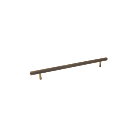 Long, thin brown object on a white background. BellevueKnurledSolidBrassDoorPullHandleInDarkBrushedBrass