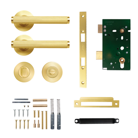 Collection of gold door handles and lock mechanism on a white background. BellevueSolidBrassKnurledMorticeLockPrivacyLeverSetInBrushedSatinBrass