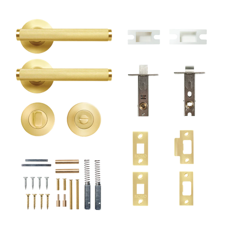 Collection of gold door handles and lock mechanism on a white background. BellevueSolidBrassKnurledTubularLatchPrivacyLeverSetInBrushedSatinBrass