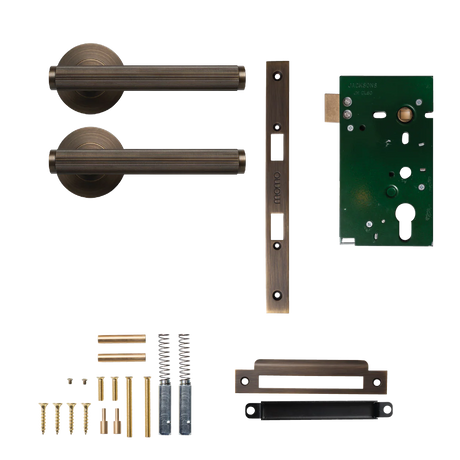 Door handle and lock mechanism set on a white background. BellevueSolidBrassLinedMorticeLockPassageLeverSetInBronze