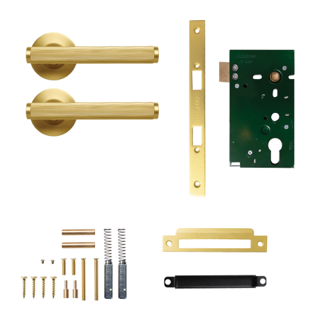 Collection of gold door handles and hardware components on a white background. BellevueSolidBrassLinedMorticeLockPassageLeverSetInBrushedSatinBrass