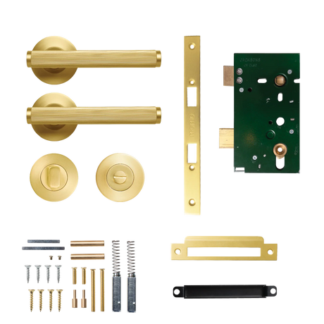 Set of brass door handles and lock components on a white background. BellevueSolidBrassLinedMorticeLockPrivacyLeverSetInBrushedSatinBrass