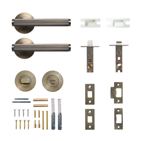 Door handle and lock mechanism set on a white background. BellevueSolidBrassLinedTubularLatchPrivacyLeverSetInDarkBrushedBrass