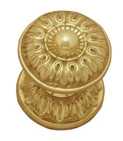Decorative gold door knob on a white background. CentreDoorKnobRnd.PB65mm