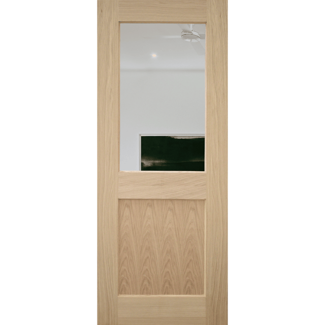A light oak interior door with a rectangular glass window in the upper half and a recessed lower panel, shown against a plain white background.