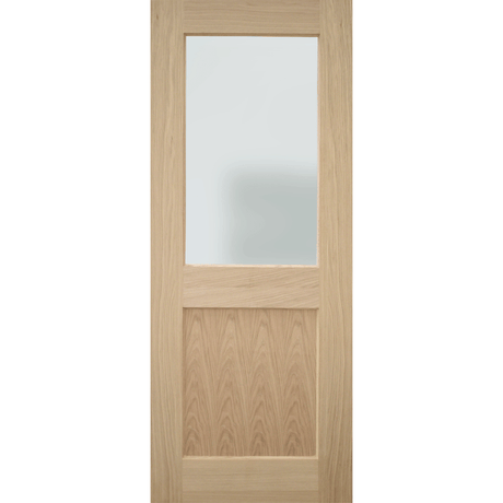 A light oak interior door with a frosted glass window in the upper half and a recessed wood panel in the lower half, shown against a plain white background.