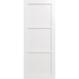 White wooden door with vertical slats on a green background. LUX3-RoutedBatten