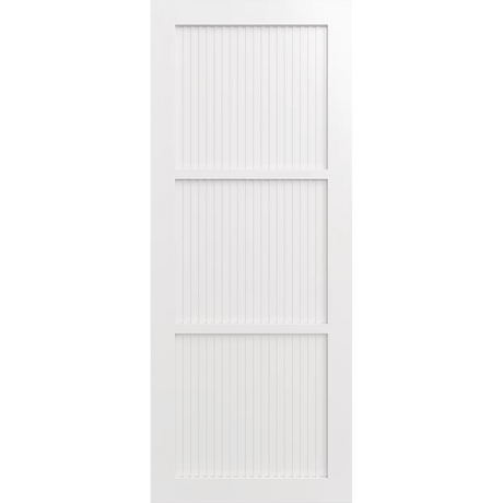 White wooden door with vertical slats on a green background. LUX3-RoutedBatten