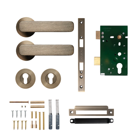 Door handle assembly with components on a white background. MomoAspenSolidBrassLeverEntranceSetInDarkBrushedBrass