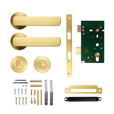 Gold door handle set with components on a white background. MomoAspenSolidBrassMorticeLockPrivacyLeverSetInBrushedSatinBrass