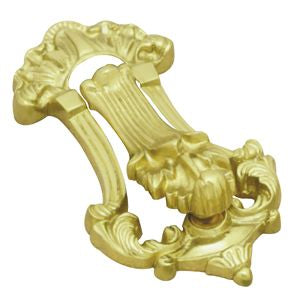 Decorative gold door knocker on a white background. OrnamentalKnockerPB185mm