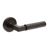 Black door handle on a white background. ZurichFlutedGN