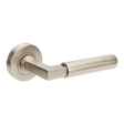 Metal door handle on a white background. ZurichHammeredBN