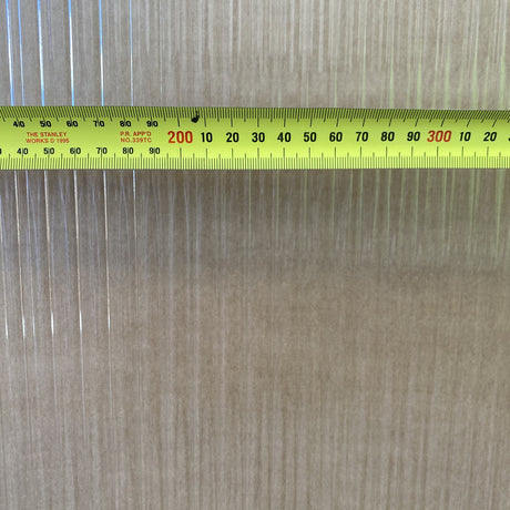 Narrowline glass close-up with a tape measure across it, showing the 10mm flutes
